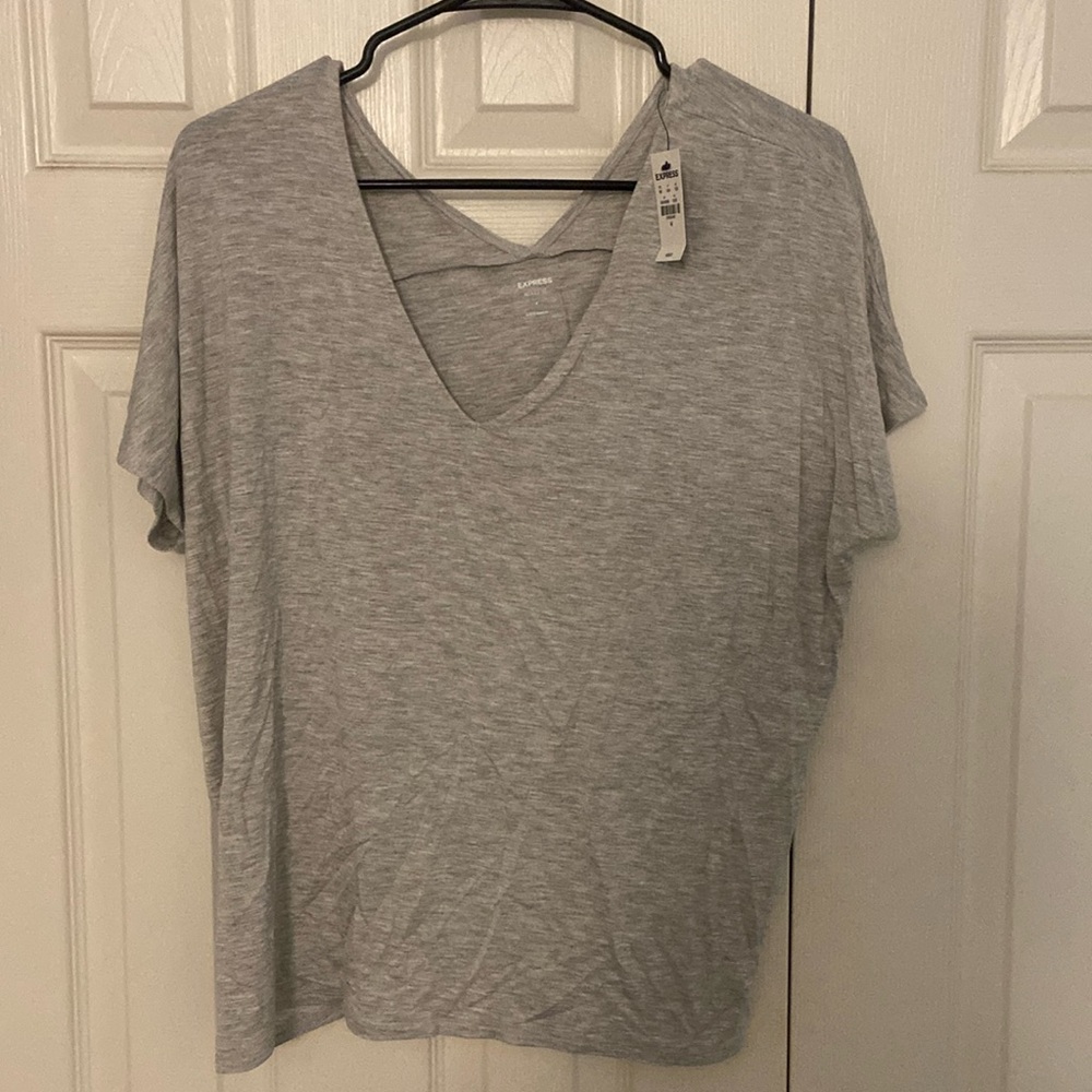 Express grey v neck shirt. New with tags. Size M